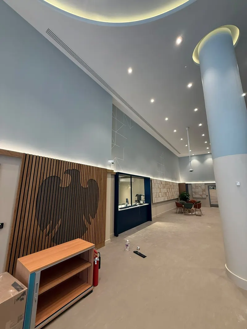 Branch floor with linear slot diffusers running along the ceiling
