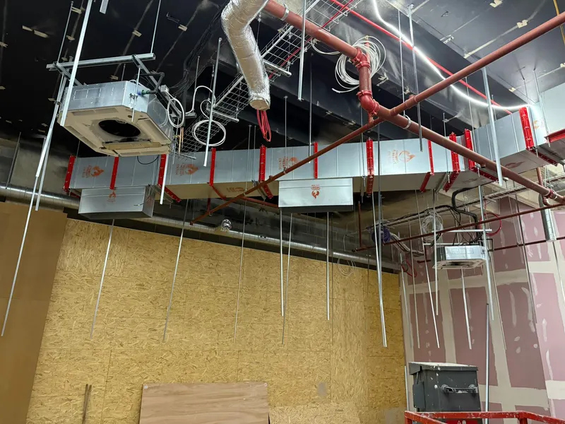 Ceiling cassette and supply ductwork going in at first fix