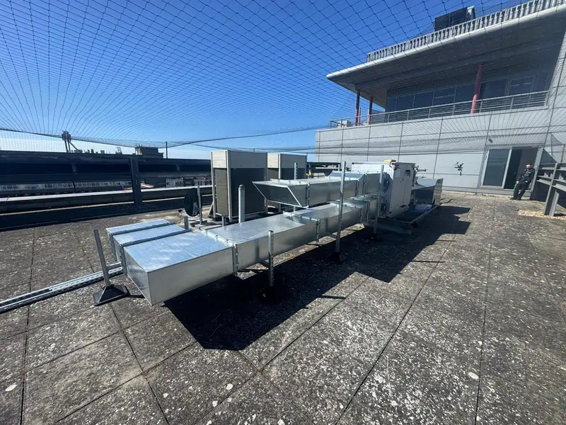 Galvanised ductwork and plant on a sunny commercial rooftop