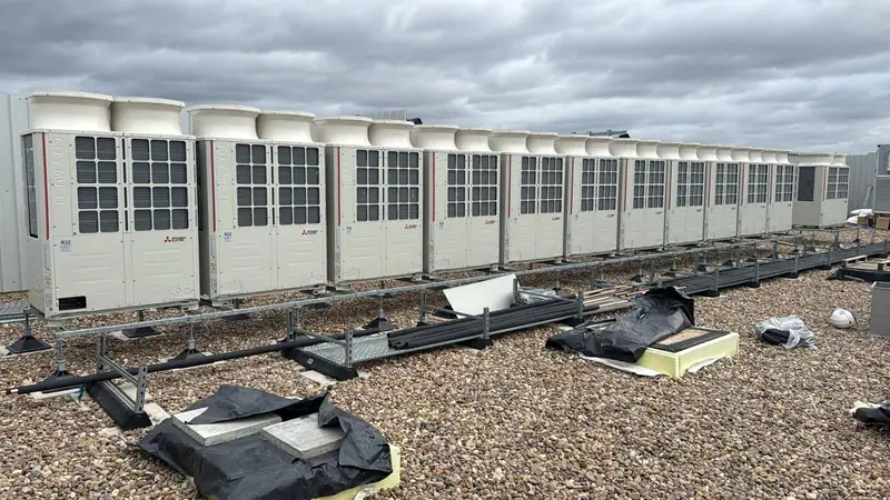 Row of VRF condensing units on a flat roof